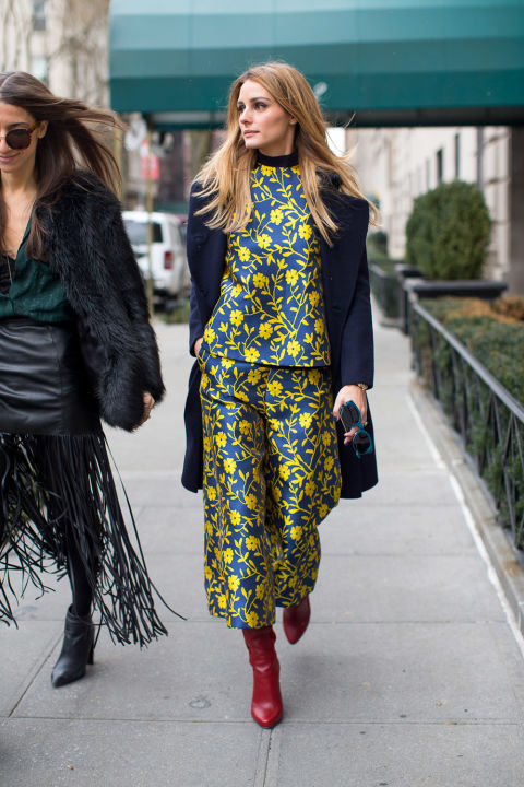 olivia-palermo-winter-to-spring-dressing-floral-pants-set-culottes-navy-coat-mockneck-top-red-boots-yellow-winter-outfits-nyfw-street-style-2016-hbz
